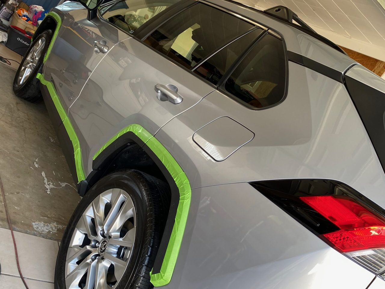 Clay Bar & Wax Detail being performed by Santana's detailing team